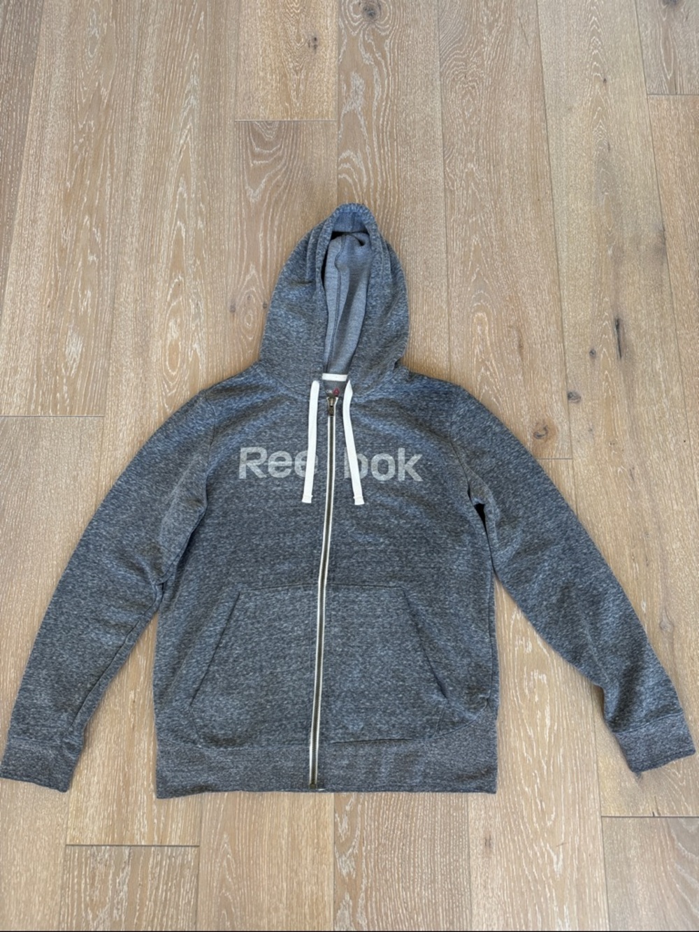 Reebok Women’s Heather Gray Zip-Up Hoodie. Size Large (fits like Medium).